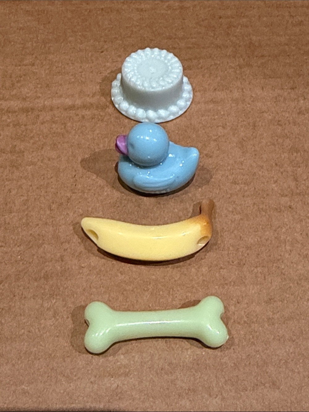 4 beads from CJ Hendry Pastel - Blue Duck, Banana, Green Bone, light green cake